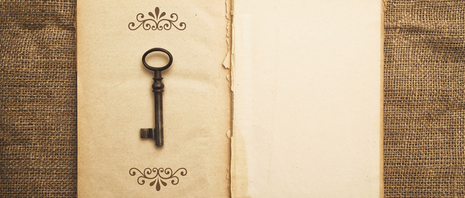 Antique key and book