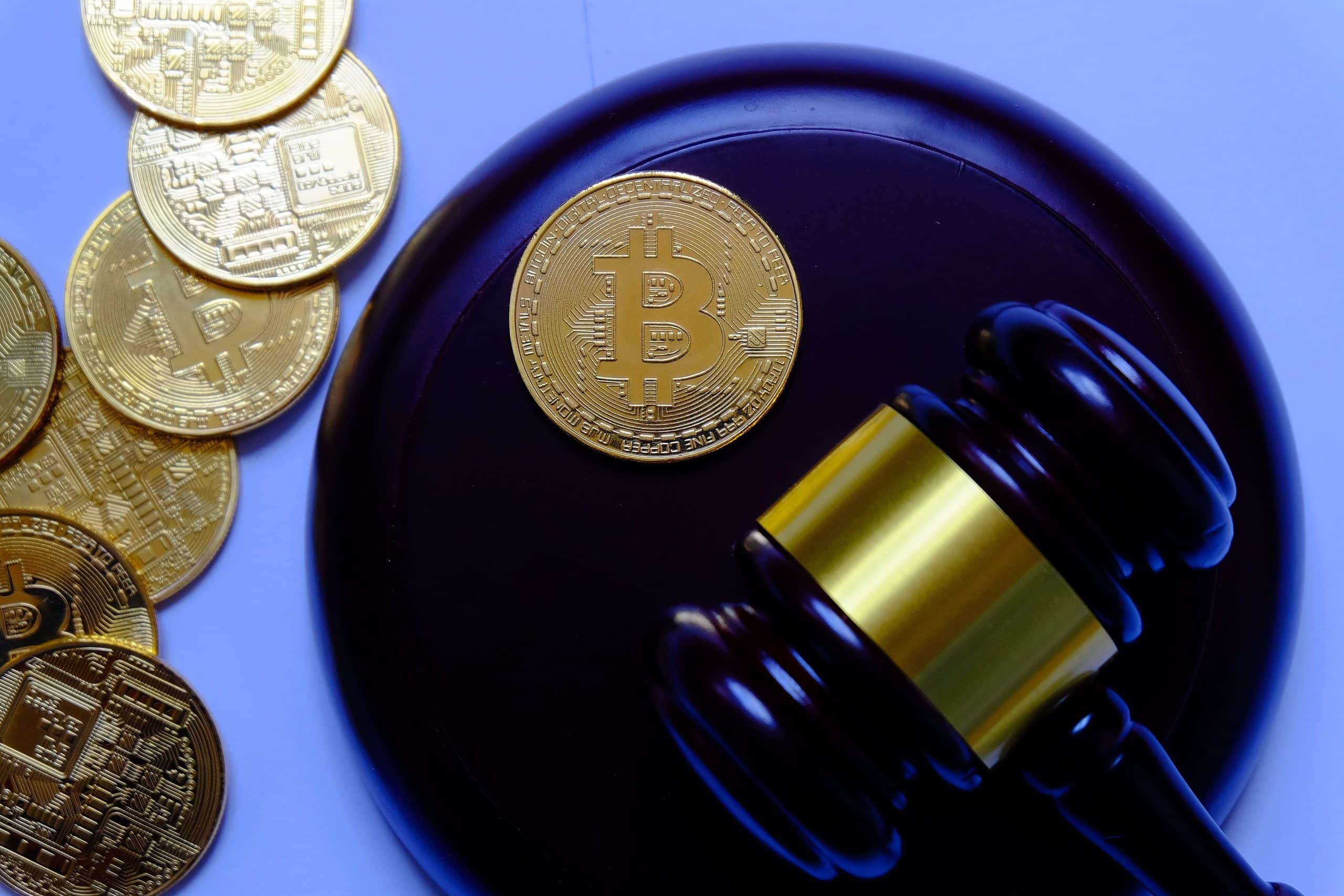 crypto coins next to gavel