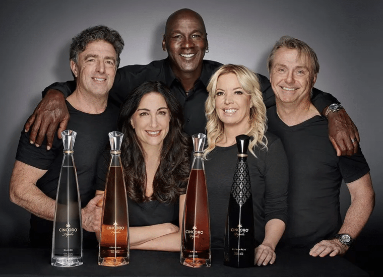 Michael Jordan and others promoting his alcohol