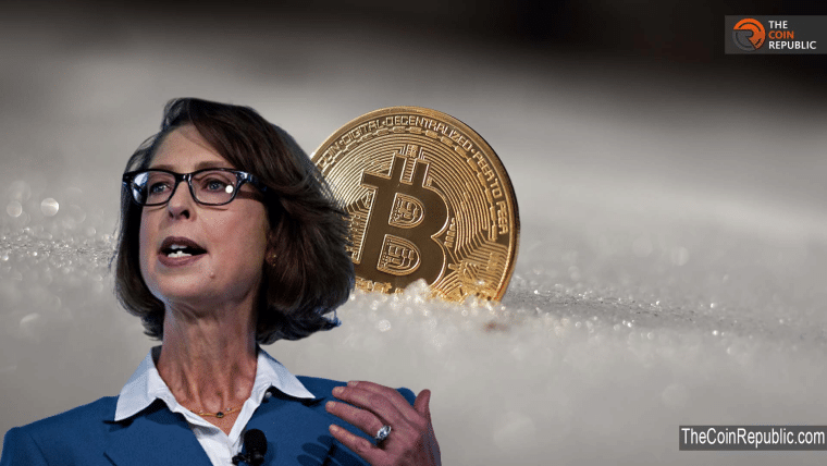 abigail johnson with a Bitcoin coin in the background