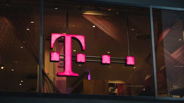 T-Mobile sign on a window - Unsplash