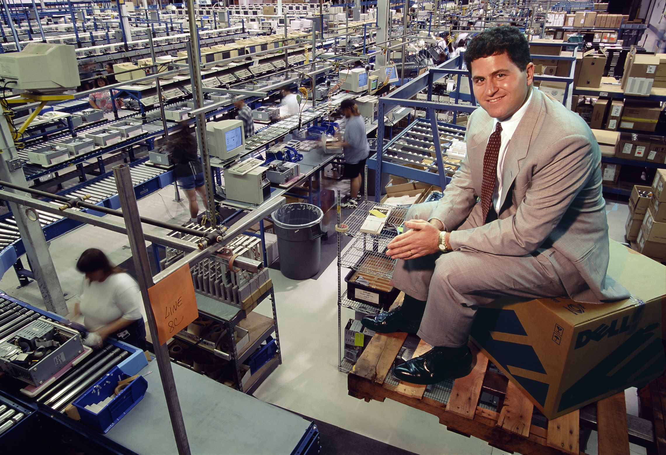 Michael Dell in a warehouse