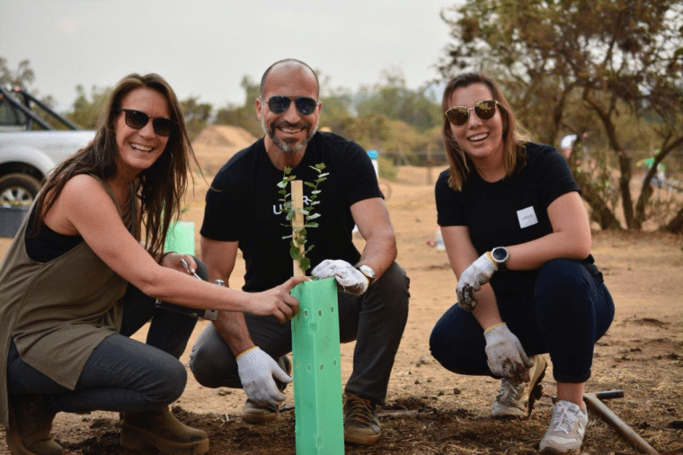 Dara Khosrowshahi planting a tree