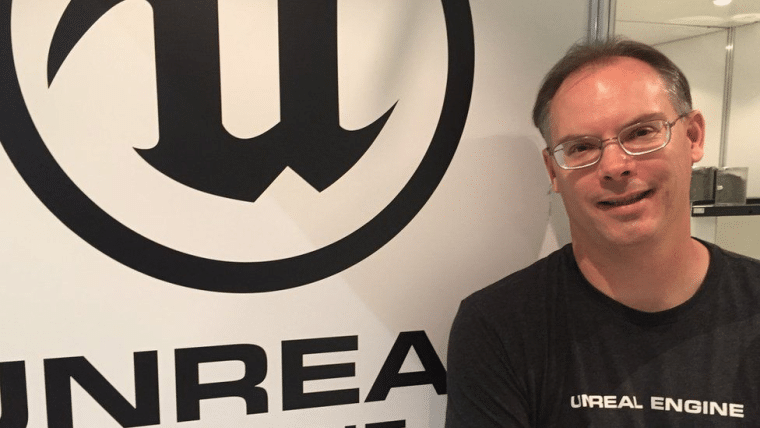 Tim Sweeney next to Unreal logo