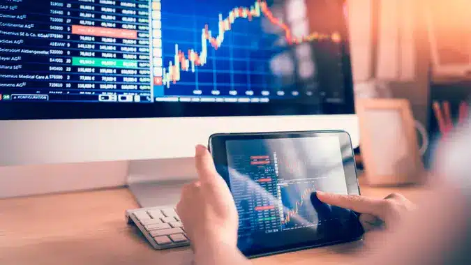 person selecting and analyzing momentum stocks