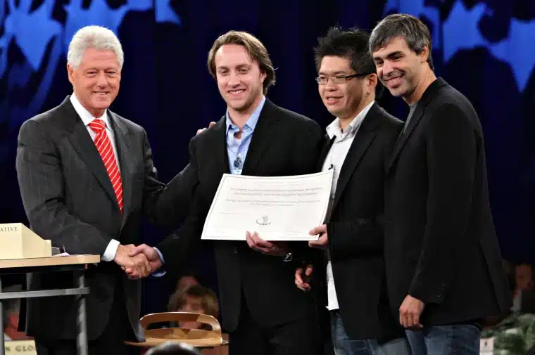 Steve Chen getting an award from bill clinton