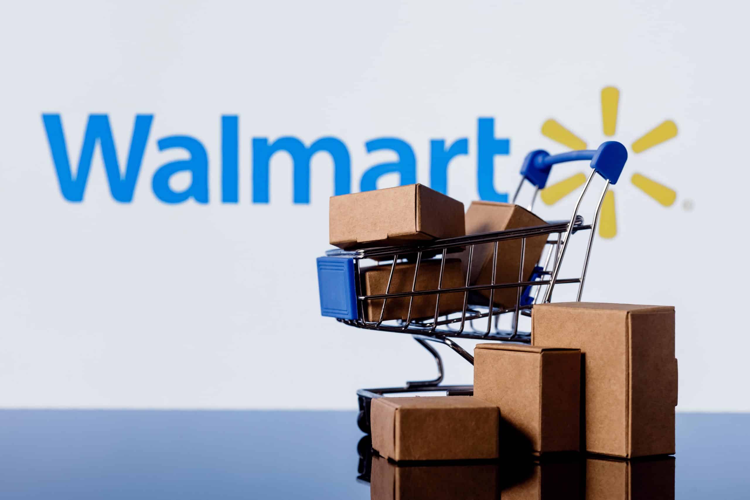 walmart logo with boxes in a shopping cart