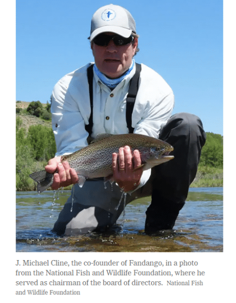 J Michael Cline holding fish