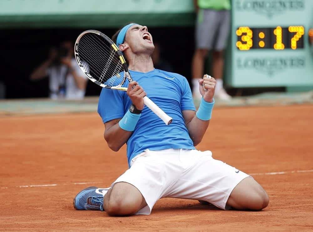 Nadal celebrates winning the 2011 French Open